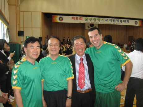 Matt with principal and volleyball team ready to play!